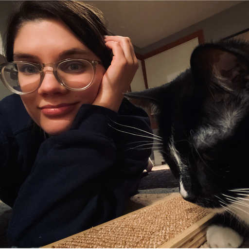 portrait of sara simon with cat